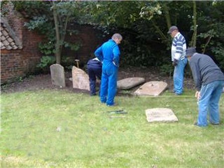 Re-erecting the stones in Easington churchyard 1
